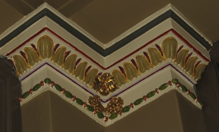 Painted trim on columns in the lobby